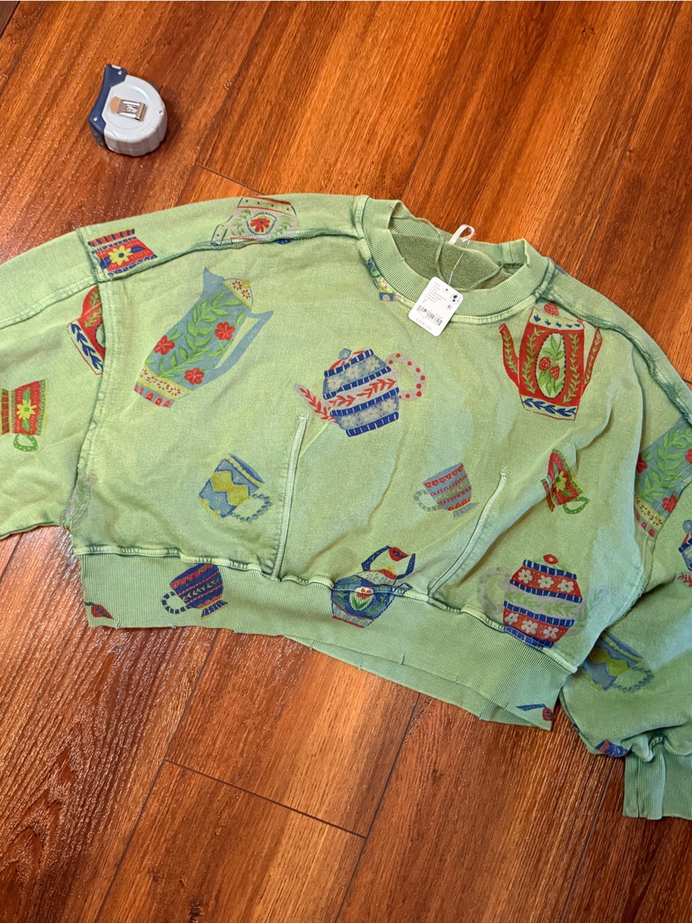 Free People Light Green Cropped Sweatshirt with Teapot Print